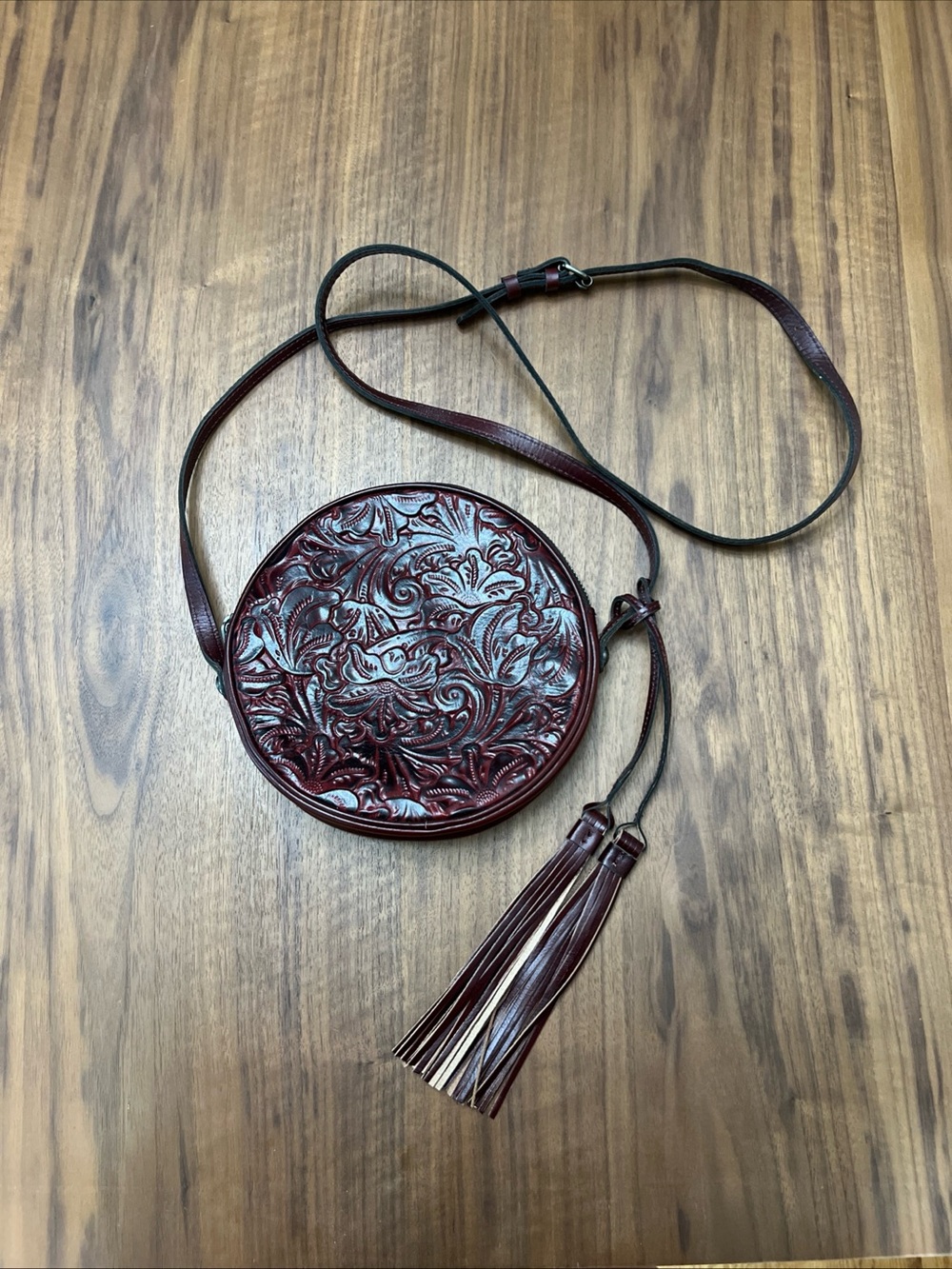 Patricia Nash Round Embossed Tassel Crossbody Bag - Burgundy